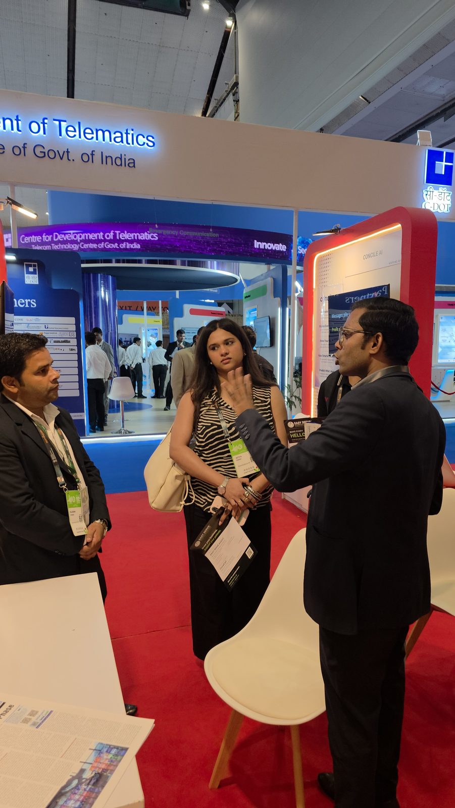 The team hosting guests at booth AI-155.