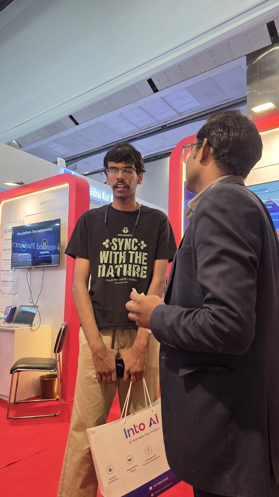 The team hosting visitors on the show floor.