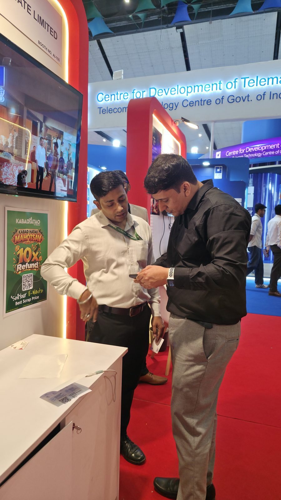 The team hosting visitors on the show floor.