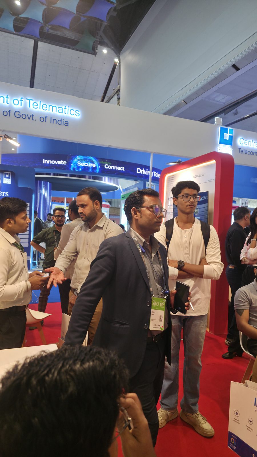 Another conversation at booth AI-155 on day 3.