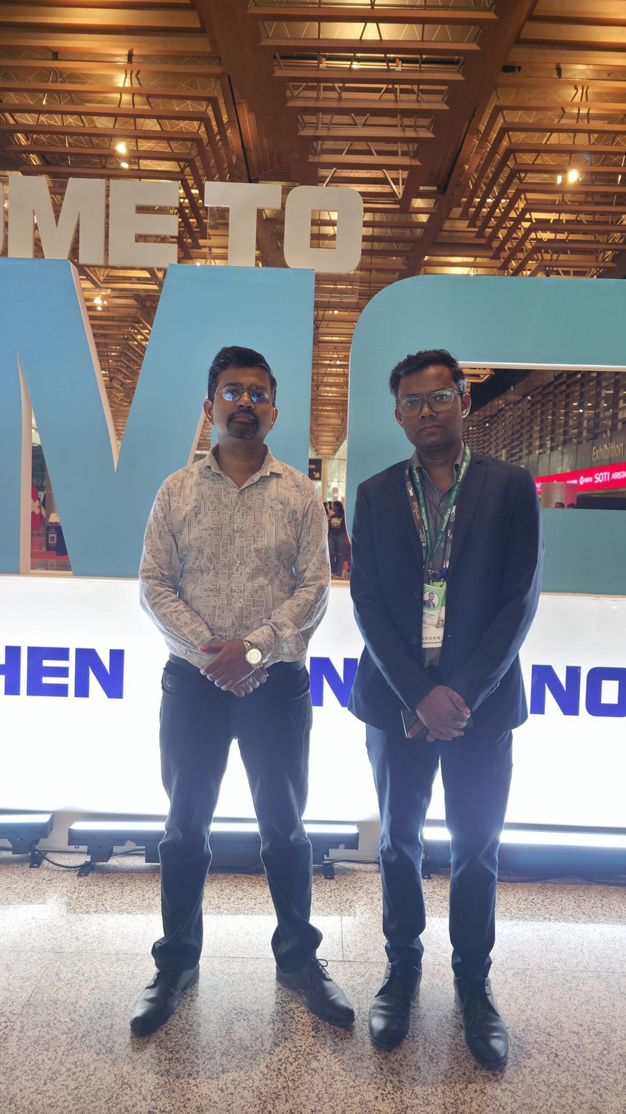 A photo in front of the IMC 2026 letters.