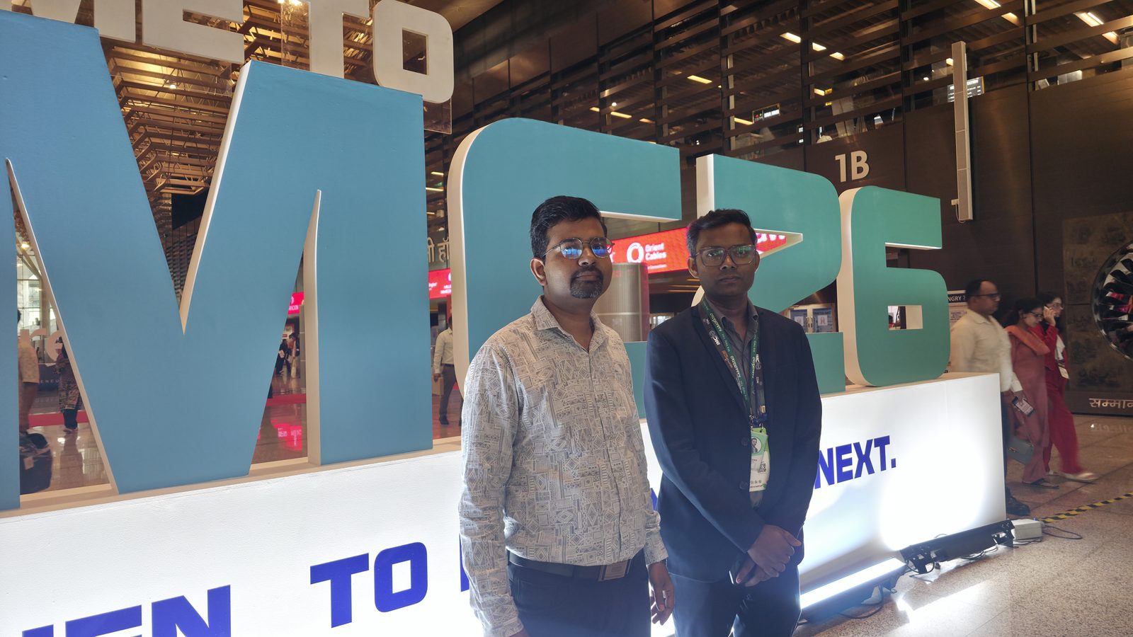 The team at the IMC 2026 welcome sign.