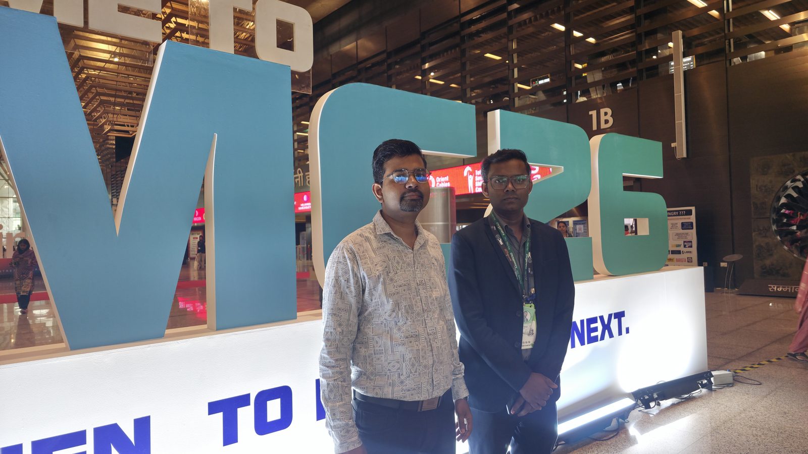 A photo in front of the IMC 2026 letters.