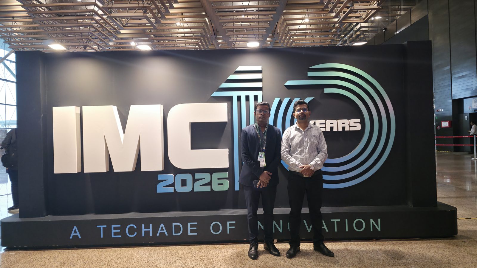A photo beside the decade mark at India Mobile Congress.