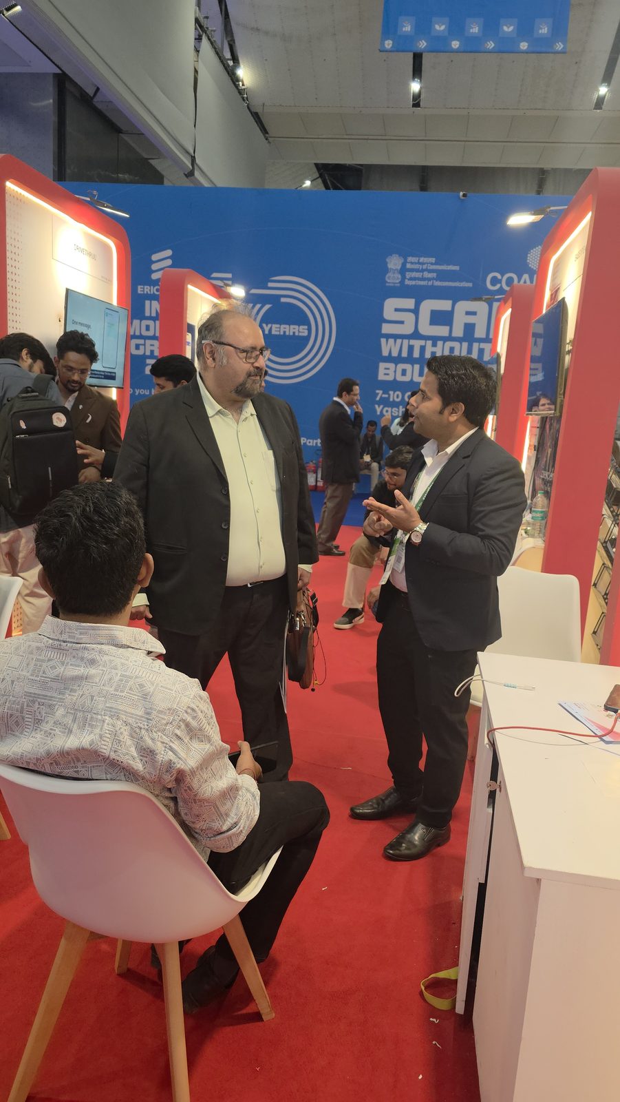 Guests talking with Kabad Hatao on day 3.