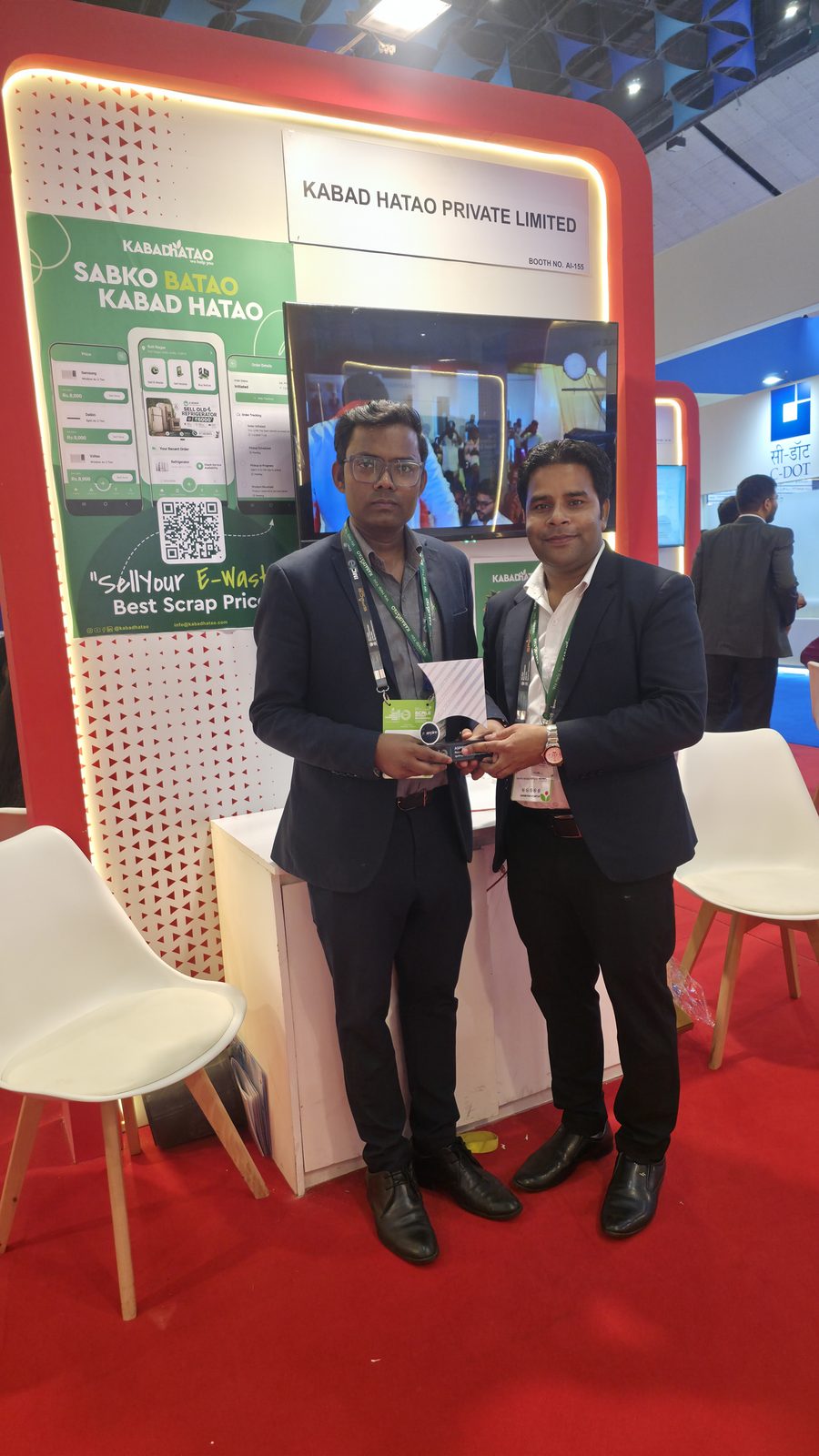 A group photo at booth AI-155, Hall No. 1.