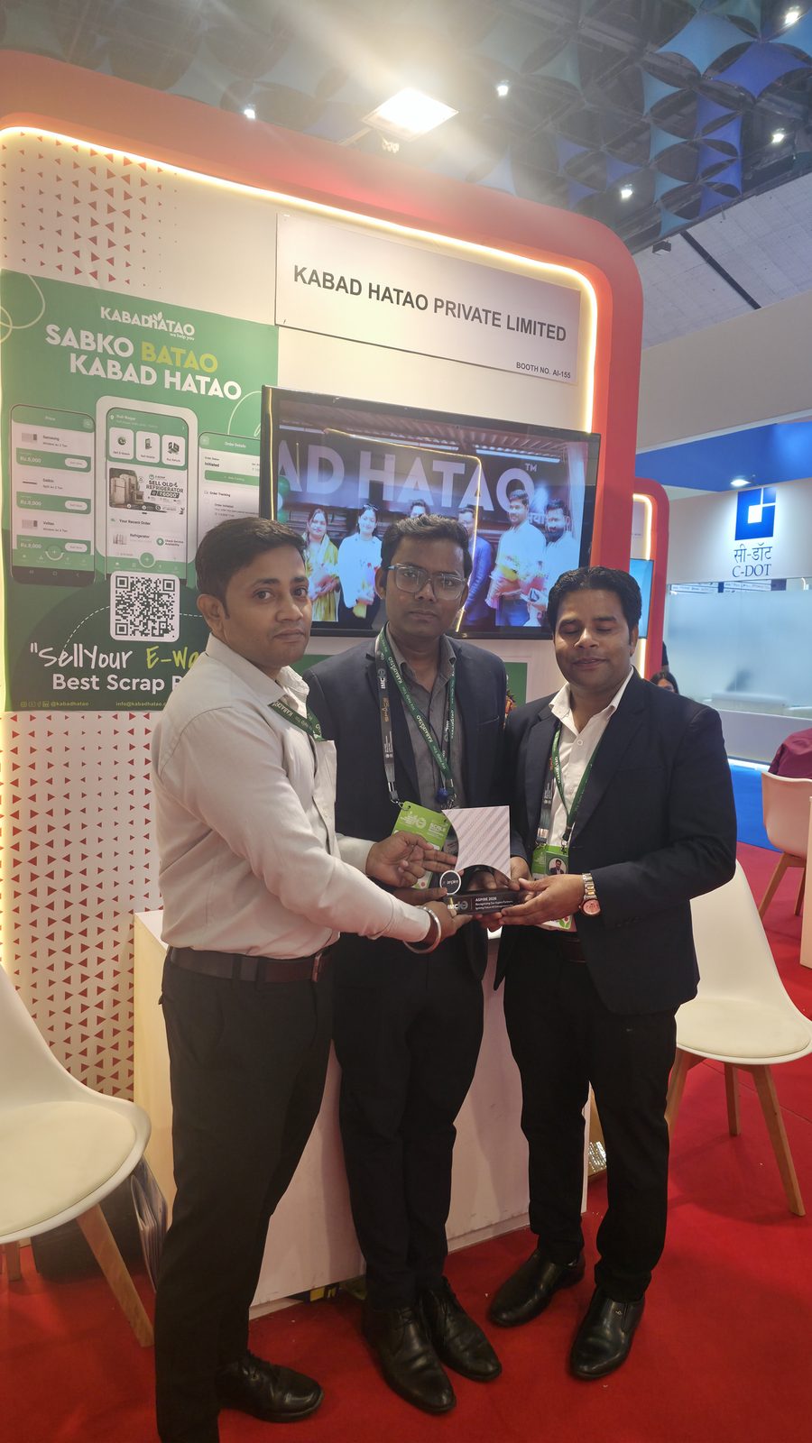 A group photo at booth AI-155, Hall No. 1.